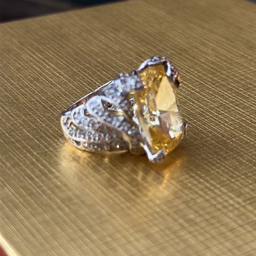 Make a statement with this amazing citrine ring in silver tone and crystals.